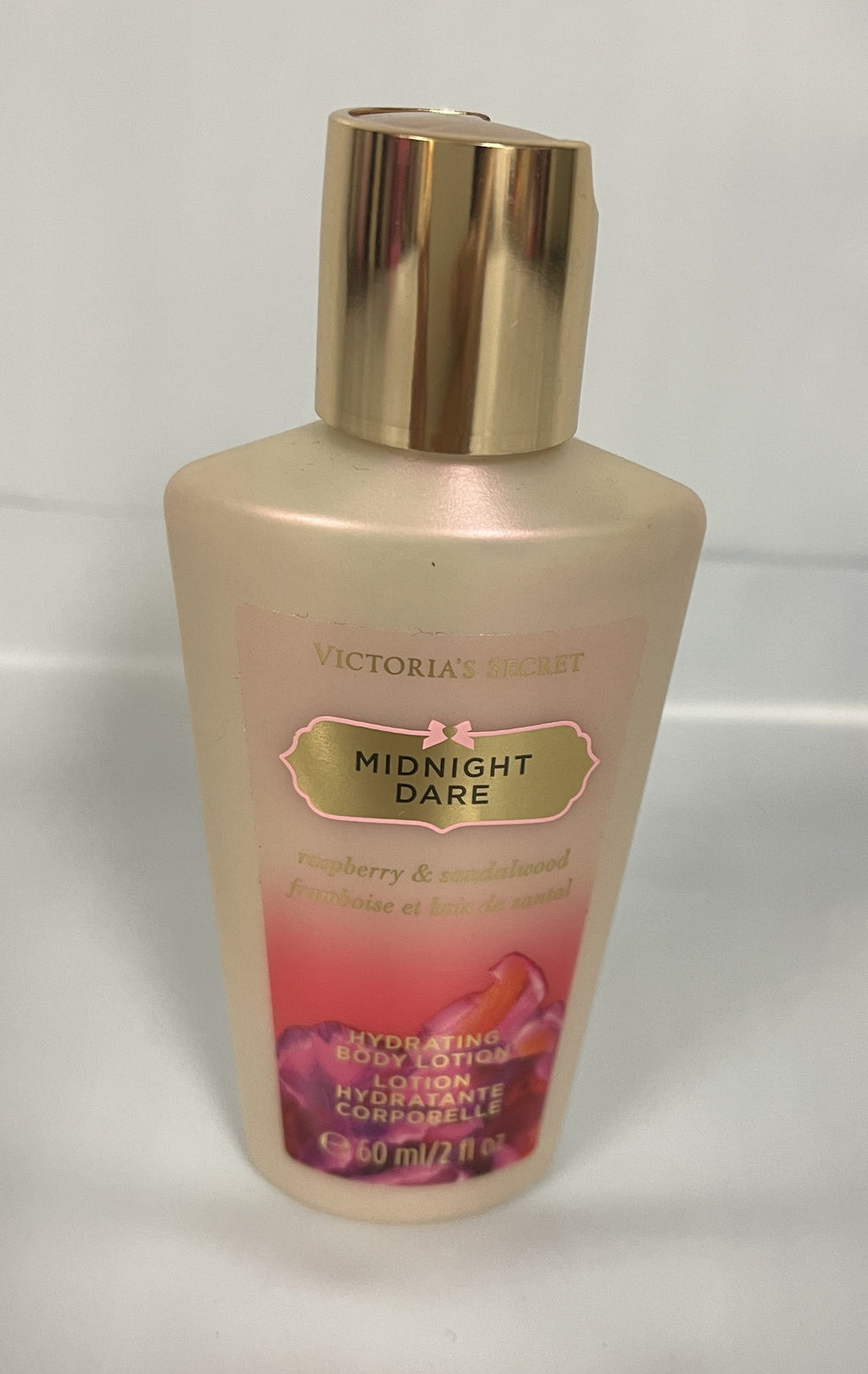 Victoria's Sizeecret Midnight Dare Hydrating Body Lotion 2fl oz. Travel Sizeize Rasberry Sizeandalwood