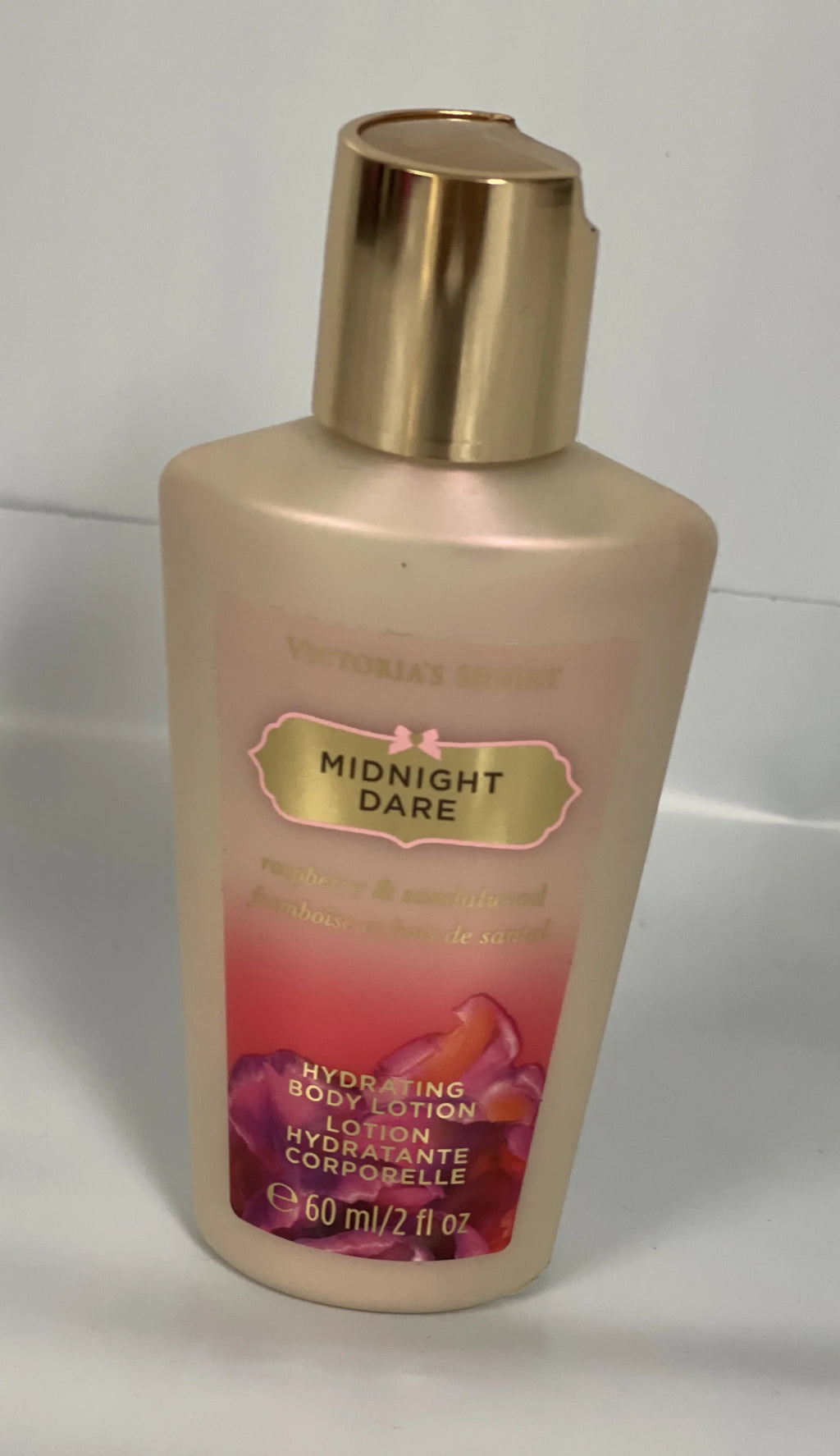 Victoria's Sizeecret Midnight Dare Hydrating Body Lotion 2fl oz. Travel Sizeize Rasberry Sizeandalwood